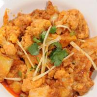 Aloo Gobi · Cauliflower and potato cooked in spices flavored with ginger. Served with 1 side dish.