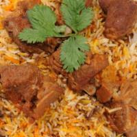 Goat Biryani · Goat bone in meat marinated flavored with spices cooked with basmati rice. It is served with...