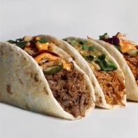 Colossal Taco & Fry Meal · 32 TACOS + 2 trays of curly fries! Wowzers! 8 Hawaiian Chicken, 8 Root Beer Beef, 8 Chipotle...