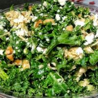 Pesto Chicken Salad · Shredded Pesto Chicken, chopped kale, feta, walnuts, house-made pesto dressing.