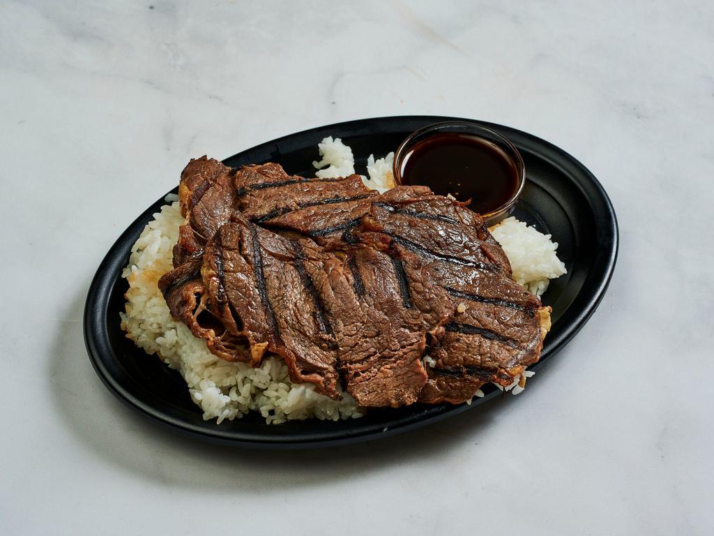 Beef Teriyaki · Thin slices of rib eye steak marinated in teriyaki sauce and grilled. Served with a side of rice.