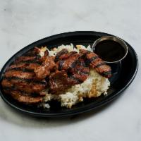 Pork Teriyaki · Thin slices of loin chop steak marinated in teriyaki sauce and grilled. Served with a side o...