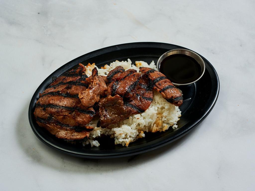 Pork Teriyaki · Thin slices of loin chop steak marinated in teriyaki sauce and grilled. Served with a side of rice.