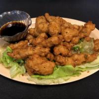 Salt and Pepper Chicken · Lightly breaded Fried Chicken with Chopped Jalapenos, White Onions, White Peppers.