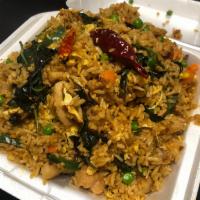 Spicy Basil Stir Fried Rice · Basil Leaves, Fresh Jalapenos, Green Bell Pepper, Peas and carrots,Onions, Eggs, Dried Red P...