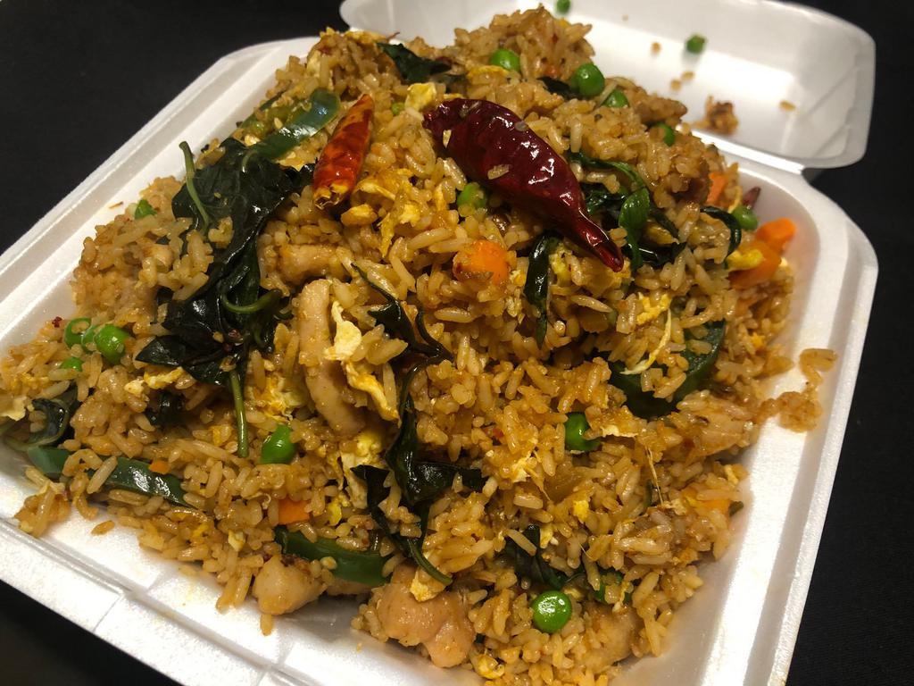Spicy Basil Stir Fried Rice · Basil Leaves, Fresh Jalapenos, Green Bell Pepper, Peas and carrots,Onions, Eggs, Dried Red Pepper,sauteed with homemade spicy sauce.