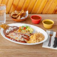 Enchiladas Rojas Suizas de Queso · 4 dipped tortillas in special red sauce filled with cheese and topped with melted quesadilla...