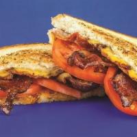Adult Grilled Cheese Sandwich · Provolone, cheddar, American cheese, tomato and bacon.