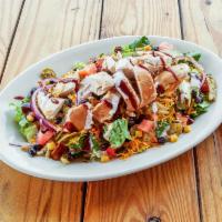 South Western BBQ Chicken Salad · Fresh mixed greens topped with BBQ chicken, black beans, grilled corn, diced avocado, choppe...
