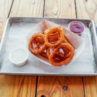 Beer Batter Onion Rings · Beer battered, sweet yellow onion rings fried to a crisp. Served with a dipping sauce of you...