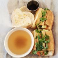 Banh Mi  · Vietnamese French baguette loaf includes sliced jalapeno, cilantro, cucumber, egg batter, so...