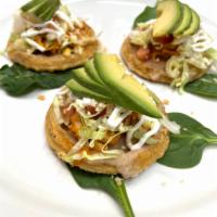 Mini Sopes · Three mini thick corn dough tortilla topped with your choice of meat, beans, lettuce, tomato...