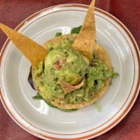 Guacamole con Chips · Fresh house made chunky guacamole with a side of chips