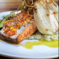 Citric Salmon · Grilled salmon in a lemon confit sauce. Served with vodka citron risotto, baby zucchini and ...