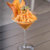 Ceviche Mix · Marinated fish and shrimp in lime juice and leche de tigre mixed with crispy sweet potatoes.