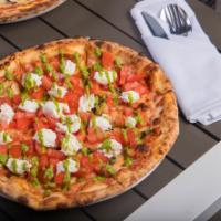 Caprese Pizza · Tomato sauce, mozzarella, fresh tomato, fresh mozzarella and pesto sauce.