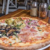 Quattro Stagioni Pizza · Tomato sauce, mozzarella, ham, artichoke, mixed olives, red onion and mushrooms.