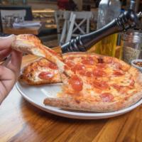 Diavola Pizza · Spicy tomato sauce, mozzarella, pepperoni, onion and oregano.