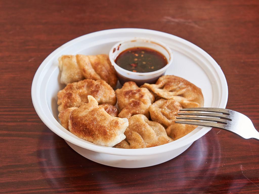 Dumpling 饺子 · Steamed or fried. Choice of  Pork,chicken   or vegetables.