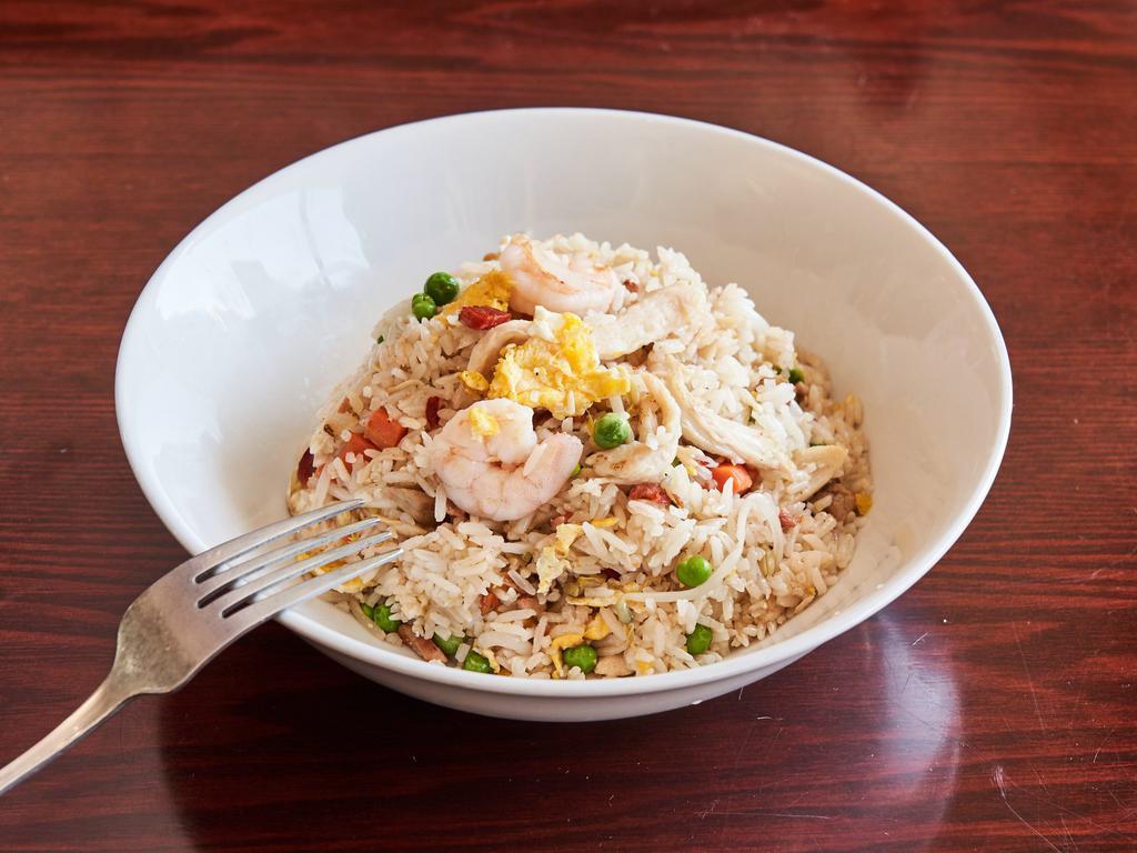 Yang Chow Fried Rice 扬州炒饭 · Traditional Chinese street food. Stir-fry jasmine rice with egg, peas, carrots, onion, bean sprouts, pork, chicken and shrimp.