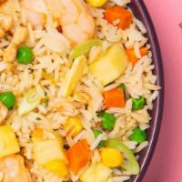 Pineapple Shrimp Fried Rice 菠萝虾炒饭 · South Asian style fried rice with egg, peas, carrots, onion, bean sprouts and chopped pineap...
