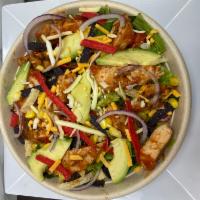 Santa Fe Salad · Santa fe chicken, romaine, avocado, fresh corn, Jack and cheddar cheese, tomatoes, onions an...