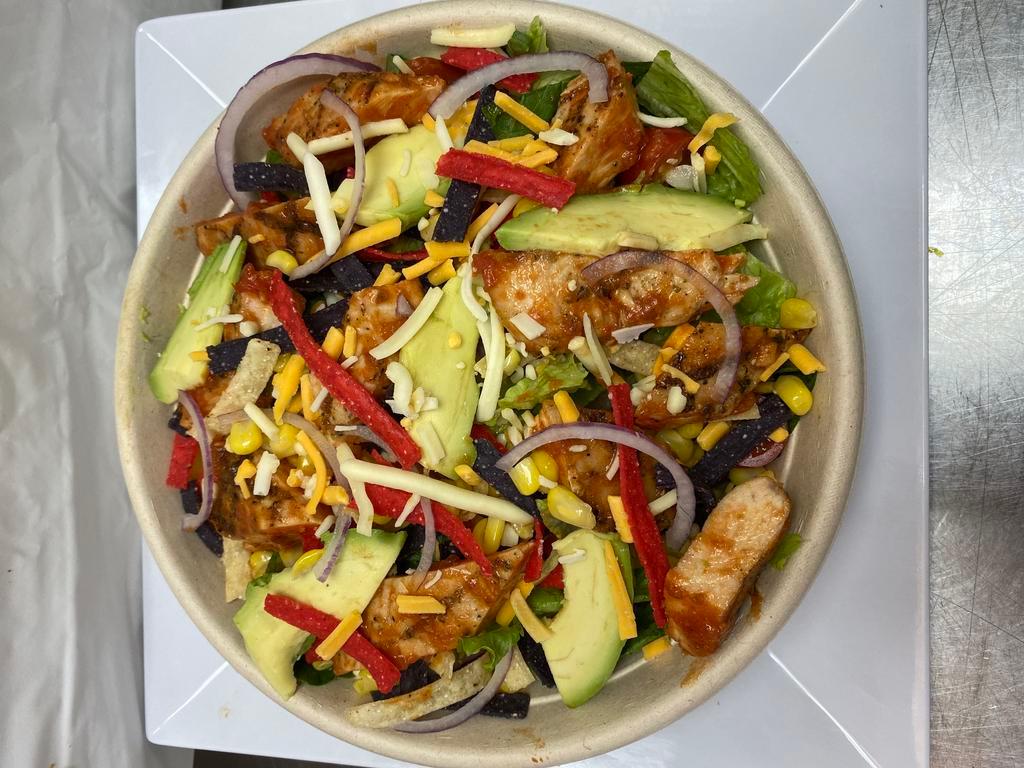 Santa Fe Salad · Santa fe chicken, romaine, avocado, fresh corn, Jack and cheddar cheese, tomatoes, onions and tortilla strips. We recommend smoky chipotle or low-fat ranch dressing.