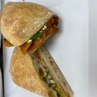 Buffalo Chicken Melt · Breaded chicken cutlet, buffalo sauce, saga blue cheese, fresh scallion, and blue cheese spr...