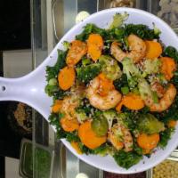 Teriyaki Shrimp Quinoa Bowl · Shrimp, Brussel sprouts, kale, carrots, scallions and broccoli tossed with very teriyaki sau...