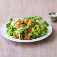 Caesar Salad · Romaine lettuce, cherry tomatoes, Parmesan cheese and croutons with Caesar dressing.