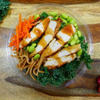 Asian Sesame Bowl · Grilled chicken breast, chow mein, edamame, kale, red cabbage, carrots and a side of Asian S...