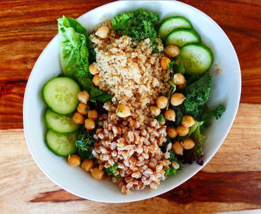 Quinoa Bowl · Spinach, cucumbers, roasted red peppers, chickpeas, quinoa, eggs and Honey Balsamic dressing