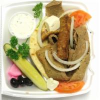 Gyro Sandwich · Cooked on a spit and wrapped in a pita. 