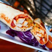 Chicken Shawarma Wrap  · Grilled chicken breast, tomatoes, arabian pickles & our home-made Shawarma sauce