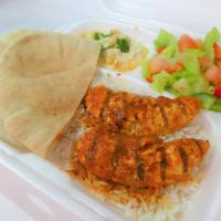 Chicken Kabob Combo · Chicken on Basmati rice, served with traditional Hommus, Mediterranean salad and Pita bread