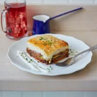 Mousakas · Potato, eggplant, zucchini, ground beef sauce and Greek bechamel.