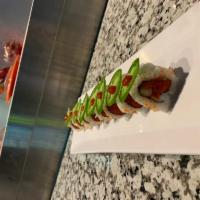8 Piece Spicy Tuna Roll · Cucumber, spicy tuna and sesame seed outside.