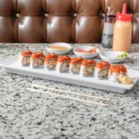 8 Piece Lion King Roll · 2 shrimp tempura, carrot, avocado, cream crab and spicy tuna on top.
