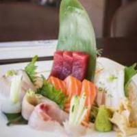 Sashimi Dinner · 18 pieces of fresh sashimi. Served with miso soup and salad.