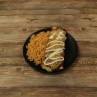 Baja Burrito · Raw. Grilled chicken or steak, chorizo, refried beans, chile con queso, ranchero sauce, sour...