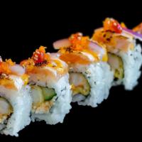 Yakuza Roll · Shrimp tempura, spicy crab salad, cucumber, topped with spicy seared salmon, red onion