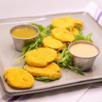 Fried Pickles · Cornbread fried pickle, jalapeno jam, sweet and sour dill cream sauce