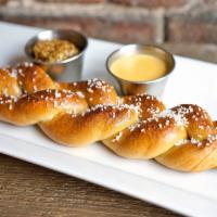 Hot Baked Pretzel · Choice of savory or sweet sauce