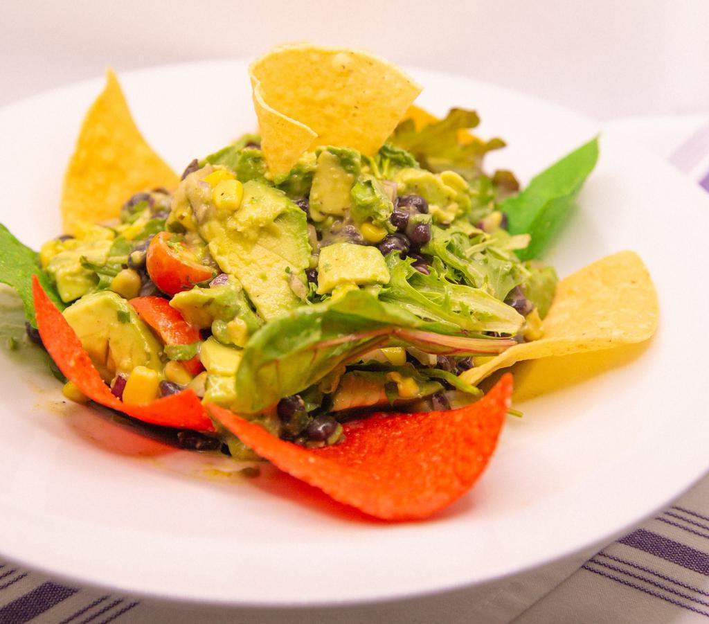 Avocado Salad · Fresh avocado, tomato, black beans, red onions, corn and cilantro with a cumin vinaigrette