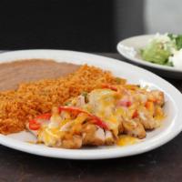 Pollo Ixtapa · Sliced chicken breast topped with grilled onions, bell peppers and melted blended cheeses. S...