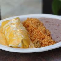 Burrito con Queso · A large flour tortilla filled with ground beef and topped with chile con queso. Served with ...