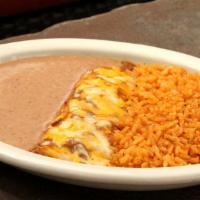 Nino Enchilada · Served with rice and refried beans.