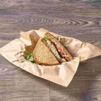 Tuna Salad Sandwich · Chunky white tuna with a seasoned mayonnaise dressing, lettuce, tomato, onion and mayo.
(600...