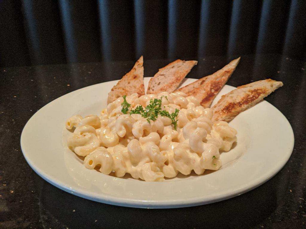 Build Your Own Mac and Cheese · Big bowl of cellentani pasta in cheesy Alfredo sauce. Served with toasted garlic bread.