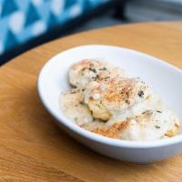 Biscuits and Gravy · Herbed cheddar biscuits, duck fat gravy. Add 2 eggs and fried chicken for an additional char...